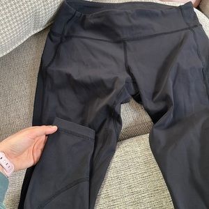 Lululemon women’s plain black leggings with ankle texture - retired style.
